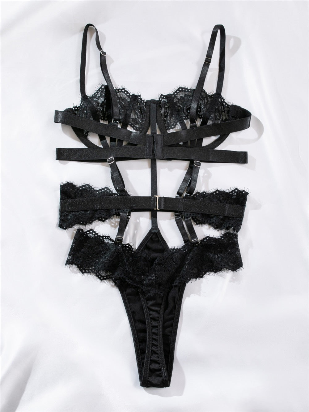 Koronkowe body z paskami i wycięciami w stylu couture