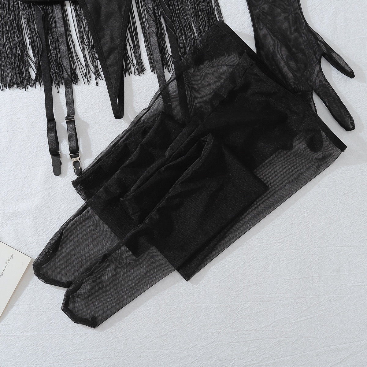 Komplet bielizny damskiej z frędzlami i pończochami