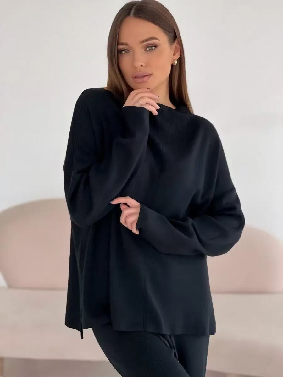 Elegancki damski komplet dzianinowy – sweter o luźnym kroju i spodnie